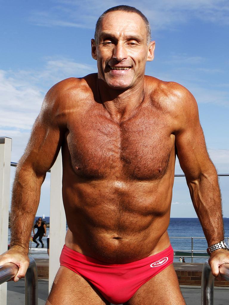 Bondi icon Dimitri Moskovich in his signature red speedos at the outdoor gym. Picture: Kristi Miller.