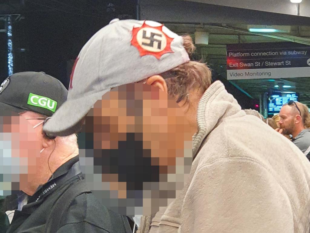 Footy fans in Melbourne were left shocked after a man sporting a Nazi swastika on his hat was spotted at Richmond train station in March 2021. Picture: Supplied