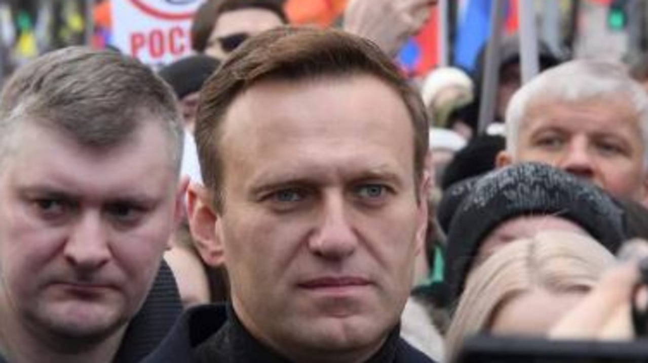 Vladimir Putin opponent Alexei Navalny (centre) believed to have been poisoned with a nerve agent, according to the German government. Picture: AFP