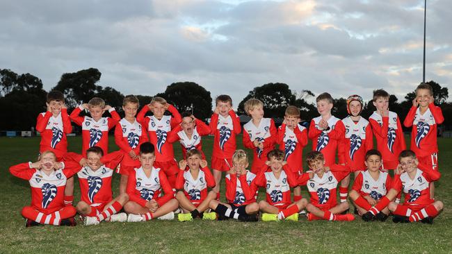 Ocean Grove Norquay under-9 football team pull their funniest faces.