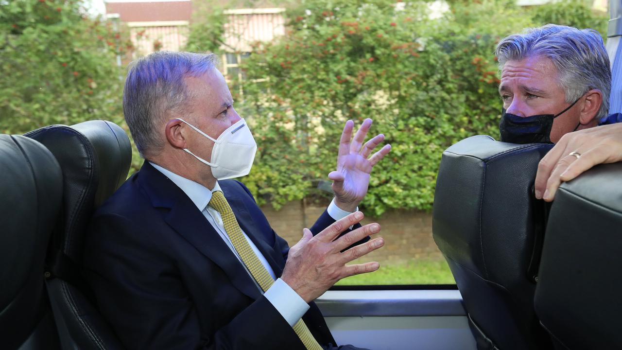 Labor leader Anthony Albanese rides along on the media bus. Picture: Liam Kidston