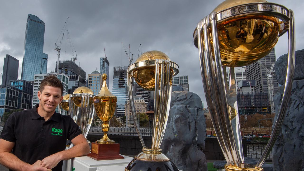 Tim Paine with Australia’s World Cup trophies. Picture: Jay Town
