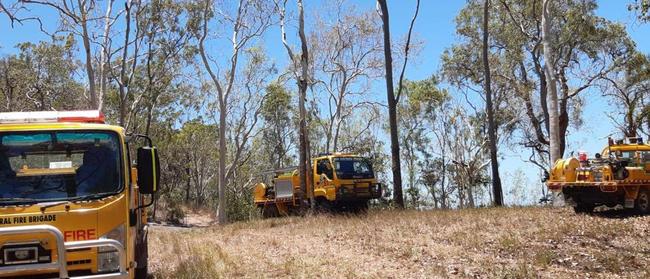 Queensland Rural Fire Service crews as well as a waterbird were fighting a bushfire at Mount Jukes near Seaforth in the Mackay region. Picture: Kevin Petith