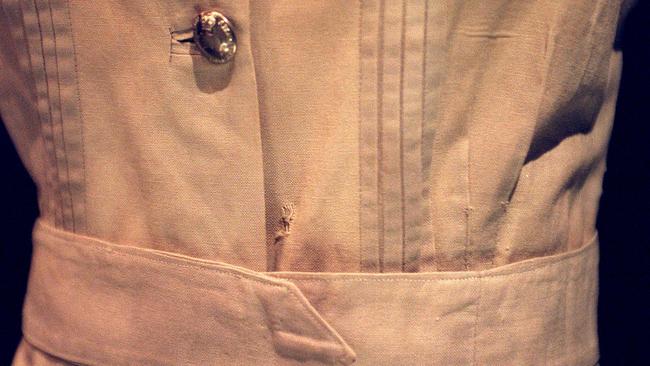 The bullet hole, above the waistband, in the uniform worn by Australian nurse Sister Vivian Bullwinkel showing where she was shot by Japanese soldiers at Bangka Island in 1942.