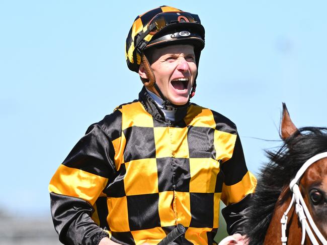 MELBOURNE, AUSTRALIA - NOVEMBER 18: James McDonald riding Joliestar reacts after winning Race 7, the Schweppes Thousand Guineas, during Melbourne Racing at Caulfield Racecourse on November 18, 2023 in Melbourne, Australia. (Photo by Vince Caligiuri/Getty Images)