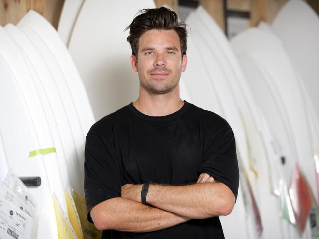 Hayden Cox pictured at his surfboard work shop in Mona Vale.Picture: Christian Gilles