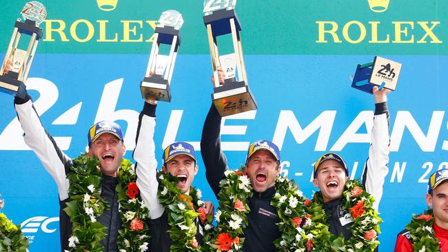 Porsche racer Matt Campbell (right) on the podium at Le Mans. Photo: Supplied
