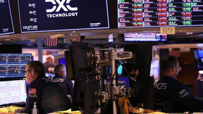 Traders work on the floor of the New York Stock Exchange on September 21, 2022. Stocks dropped in the final hour of trading after the Federal Reserve announced it would raise interest rates by three-quarters of a percentage point in an attempt to tame inflation. Michael M. Santiago/Getty Images/AFP