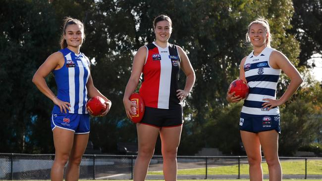 MAFLW 2020 All Australian team members (L-R) Ashleigh Riddell of the Kangaroos, Caitlin Greiser of the Saints and Olivia Purcell of the Cats pose for a photograph at Arden Street on April 27, 2020 in Melbourne, Australia. (Photo by Michael Willson/AFL Photos via Getty Images)