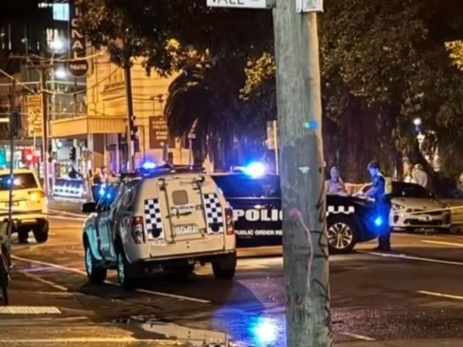 A teenager who allegedly attacked a man with a machete in an armed robbery in Melbourne’s southeast has been slapped with a string of charges.Police allege a 39-year-old man walking down Barkly Street in St Kilda was approached by a male and female about 9.15pm on Saturday, who allegedly demanded the man hand over his car keys.The male offender allegedly assaulted the 39-year-old with a machete before he and the female fled the scene empty-handed. Picture: 9News