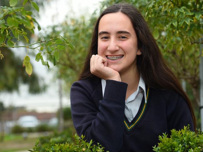 Parkdale Secondary School student Zara Bakkalis is setting up a business selling beanies to help save bees. Picture: Josie Hayden