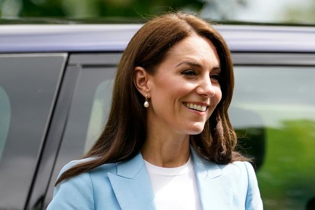 WINDSOR, ENGLAND - MAY 07:  Catherine, Princess of Wales smiles during a walkabout meeting members of the public on the Long Walk near Windsor Castle, where the Coronation Concert to celebrate the coronation of King Charles III and Queen Camilla is being held this evening on May 7, 2023 in Windsor, England. The Coronation of Charles III and his wife, Camilla, as King and Queen of the United Kingdom of Great Britain and Northern Ireland, and the other Commonwealth realms took place yesterday at Westminster Abbey today. Charles acceded to the throne on 8 September 2022, upon the death of his mother, Elizabeth II.  (Photo by Andrew Matthews-WPA Pool/Getty Images)