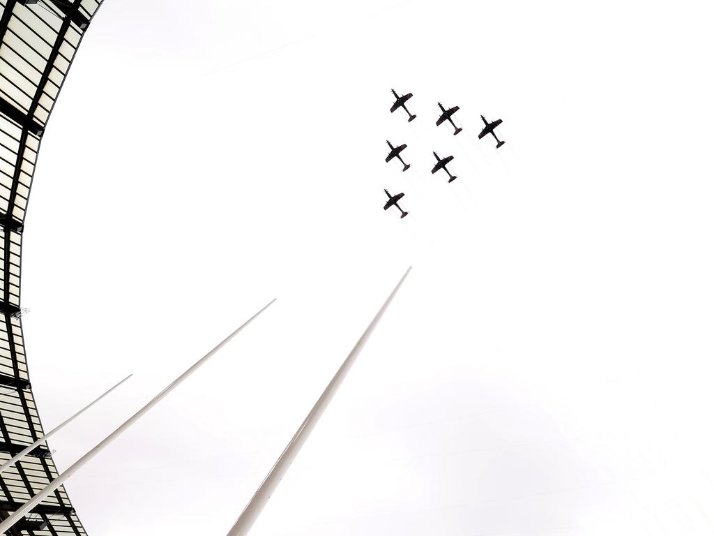 Jets fly over the MCG during the ceremony. (Photo by Robert Cianflone/Getty Images)