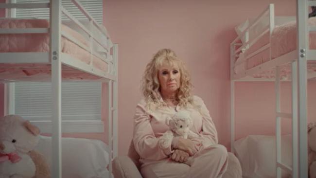 Tonia is seen in a pink bedroom she seemingly reserves for her seven pet chimpanzees. Picture: Binge