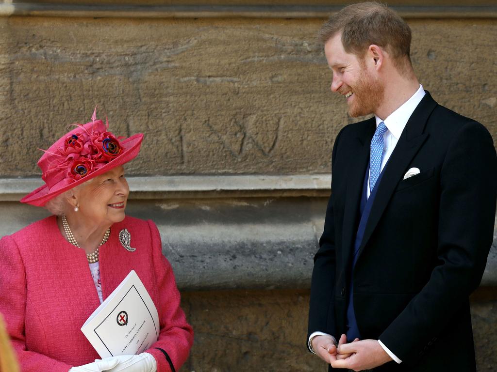 Queen Elizabeth II speaks with Prince Harry, Duke of Sussex. Harry has vowed to ‘protect’ his grandmother, according to reports. Picture: WPA Pool/Getty Images