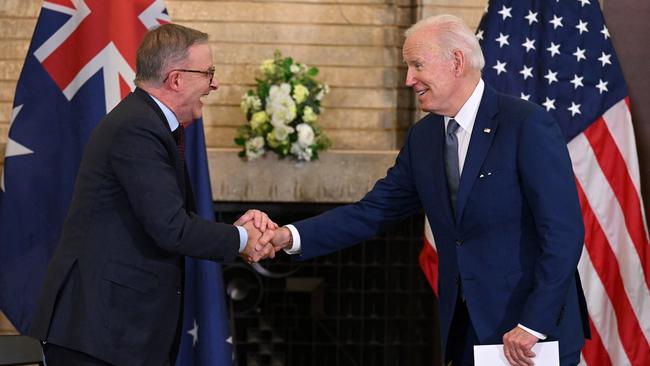 US President Joe Biden shakes hands with Prime Minister Anthony Albanese prior to their meeting during the Quad Leaders Summit at Kantei in Tokyo.