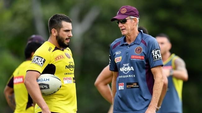 Jack Bird (left) is seen talking to Brisbane Coach Wayne Bennett.