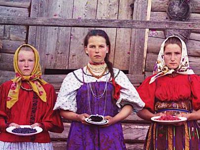 Title Translation: Peasant girls. [Russian Empire]Creator(s): Prokudin-GorskiÄ­, SergeÄ­ MikhaÄ­lovich, 1863-1944, photographerDate Created/Published: [1909]Medium: 1 negative (3 frames) : glass, b&w, three-color separation ; 24 x 9 cm.Summary: Three young women offer berries to visitors to their izba, a traditional wooden house, in a rural area along the Sheksna River, near the town of Kirillov.  Picture: Prokudin-Gorskii Collection/Library of Congress