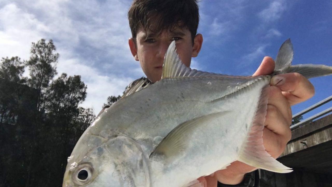 Young Harry Somlyay was over the moon when he caught this small GT in the Maroochy River.