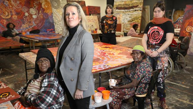 Skye O’Meara (front) has consistently and vehemently denied that white staff interfered in the making of Indigenous art. Picture: Dean Martin