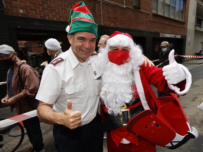 Major Brendan Nottle helping out. Picture: Alex Coppel