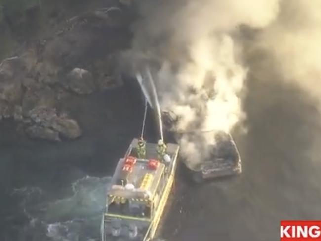 The luxury vessel caught on fire while on the water in Akuna Bay. Photo: 7 News