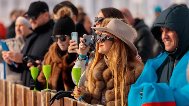 Taking in the snow-polo action.