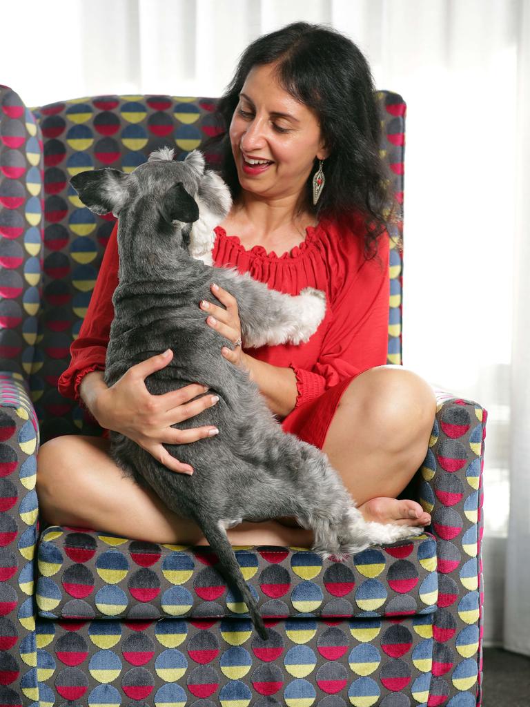 Darlinghurst resident Jo Cooper and her miniature schnauzer Angus. Picture: Christian Gilles