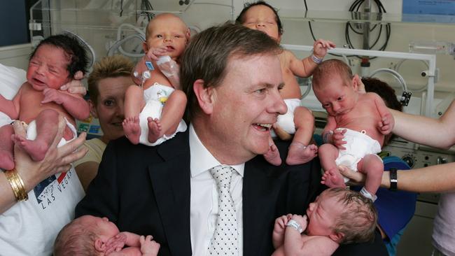 Peter Costello with new born babies at Royal Women’s Hospital.  