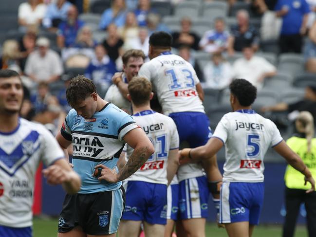 Joy and despair after the full time siren in Jersey Flegg. Picture Warren Gannon Photography