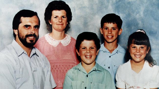 Matthew De Gruchy (blue) pictured with his family — dad Wayne, mum Jennie, siblings Adrian and Sarah — before the killings took place.