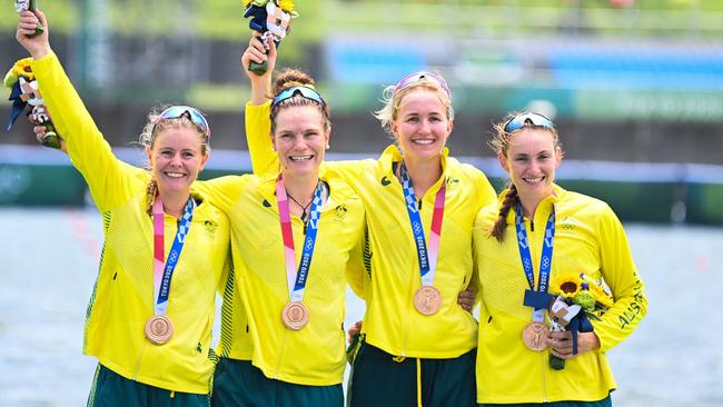 Bronze medallists Ria Thompson, Rowena Meredith, Harriet Hudson and Caitlin Cronin. Picture: AFP