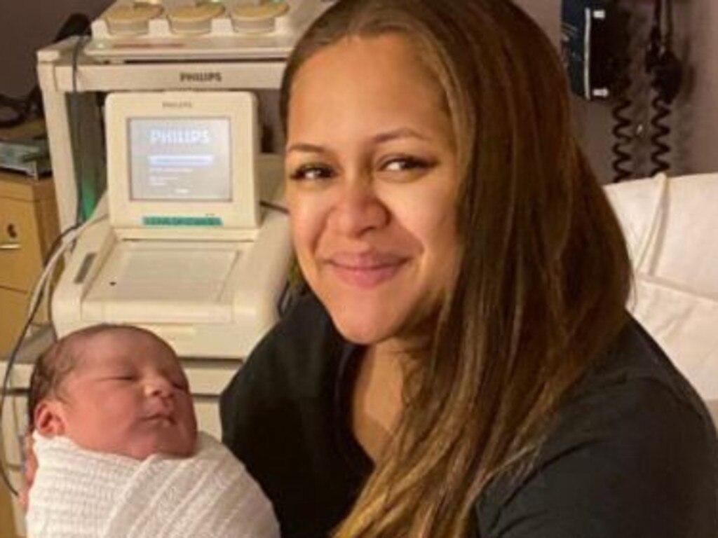 Marika Koroibete’s wife Emma with their third child.