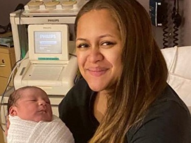 Marika Koroibete’s wife Emma with their third child.