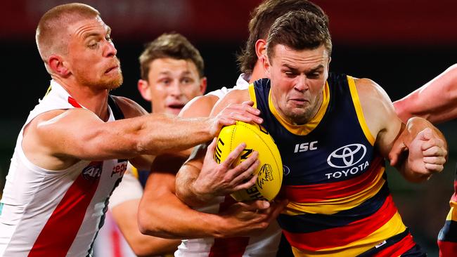 Brad Crouch tries to evade tackles against St Kilda in Round 7.