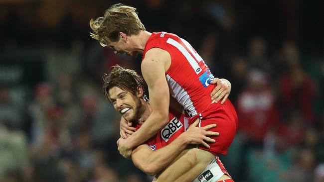 Dane Rampe is jumped on by Callum Mills. Picture. Phil Hillyard