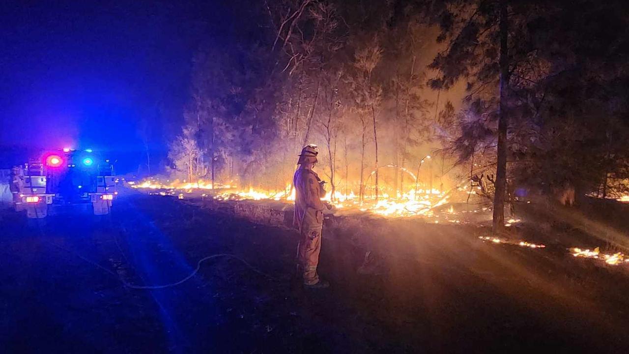 Firefighters from the Aratula Rural Fire Brigade at Cypress Gardens. Picture: QFES