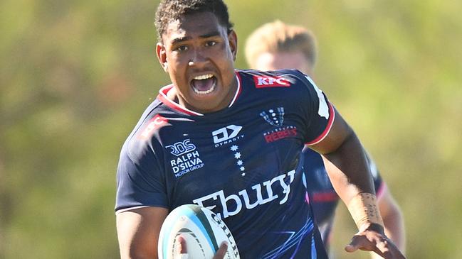 MELBOURNE, AUSTRALIA - FEBRUARY 03: Angelo Smith of the Rebels runs with the ball during the Super Rugby Pacific Trial Match between Melbourne Rebels and NSW Waratahs at Harold Caterson Reserve on February 03, 2024 in Melbourne, Australia. (Photo by Morgan Hancock/Getty Images)