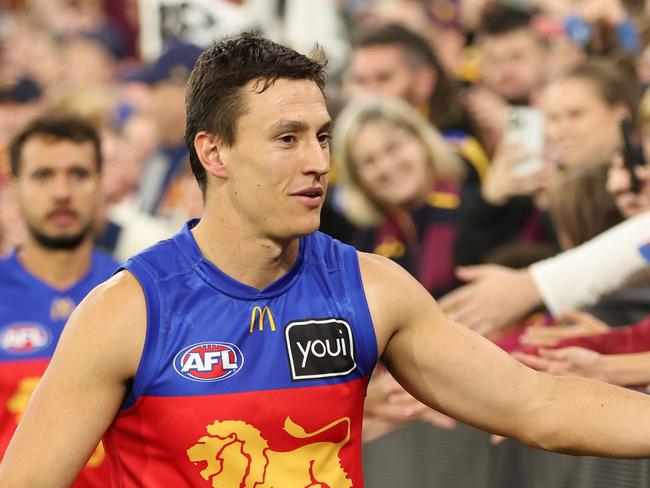 MELBOURNE, AUSTRALIA - APRIL 11: Hugh McCluggage of the Lions celebrates after the Lions defeated the Demons during the round five AFL match between Melbourne Demons and Brisbane Lions at Melbourne Cricket Ground, on April 11, 2024, in Melbourne, Australia. (Photo by Robert Cianflone/Getty Images)