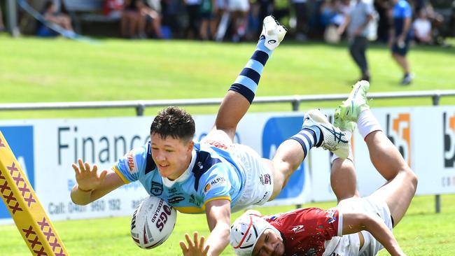 Norths Devils player Tyreece Tait gets a try Picture, John Gass