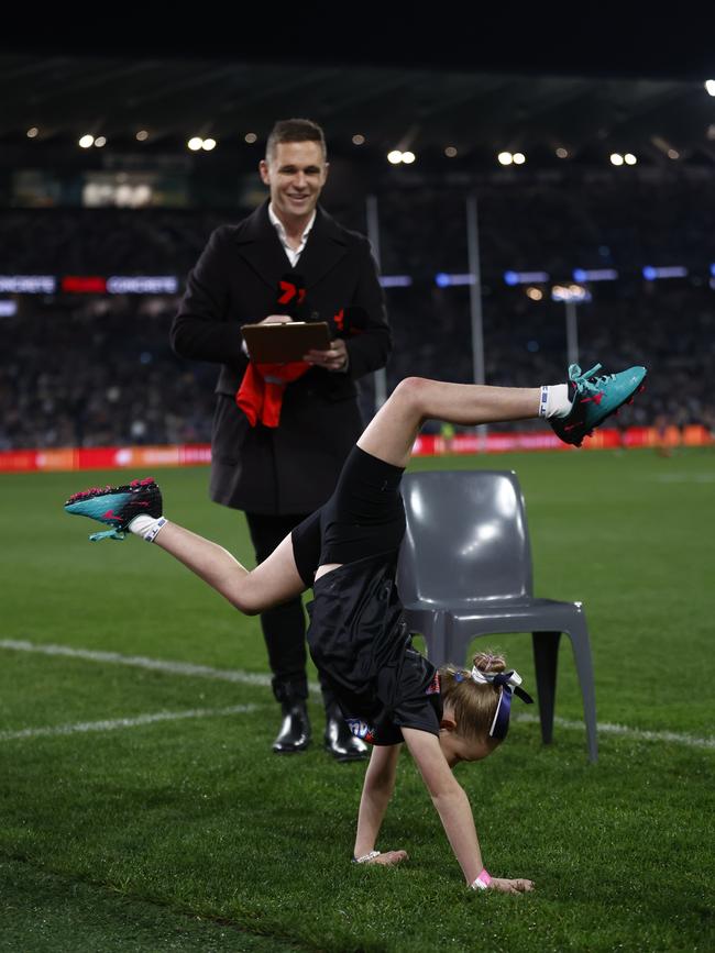 Evelyn’s handstand on live TV. Picture: Michael Willson/AFL Photos