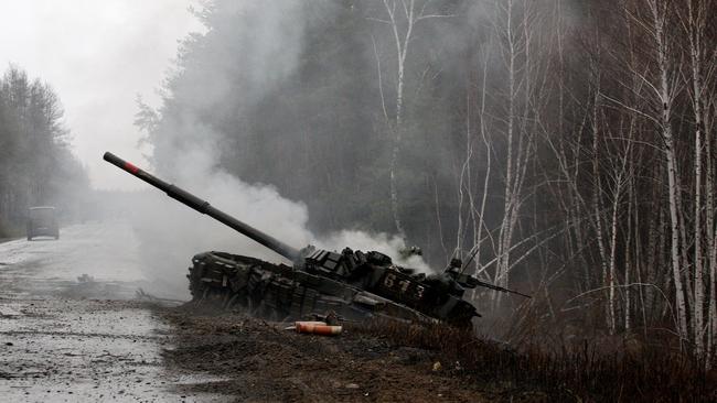 Smoke rises from a Russian tank destroyed by the Ukrainian forces. Picture: Anatolii Stepanov/AFP