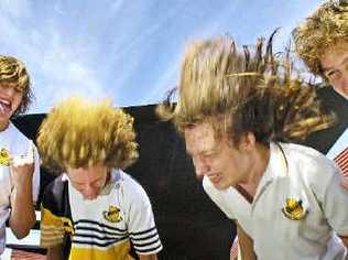 The cure: World’s Greatest Shave participants (from left) Bradley Brown, Jacob Anemaat, Daniel Windler and Blair Godfrey let their hair down at Lismore High School before it all gets shaved off for the Leukaemia Foundation.