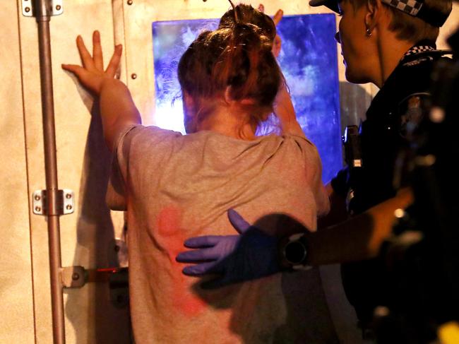 A 13yo girl was placed under arrest in regards to an alleged bottleshop robbery. Overnight ride along with the Rapid Action Patrol Unit in Townsville. Picture: Alix Sweeney