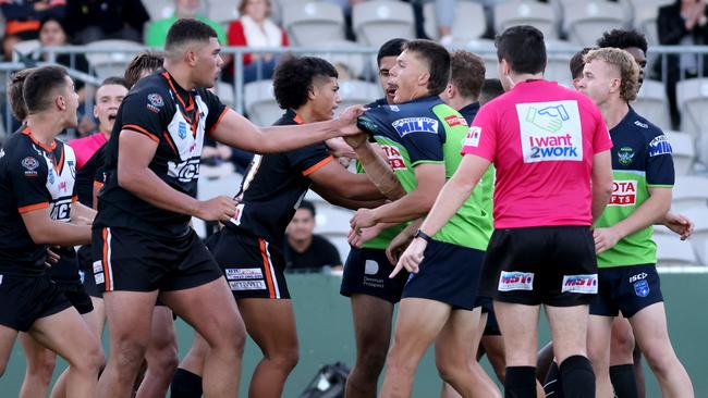 Players get involved in a scuffle at the end of the game. Picture: Damian Shaw