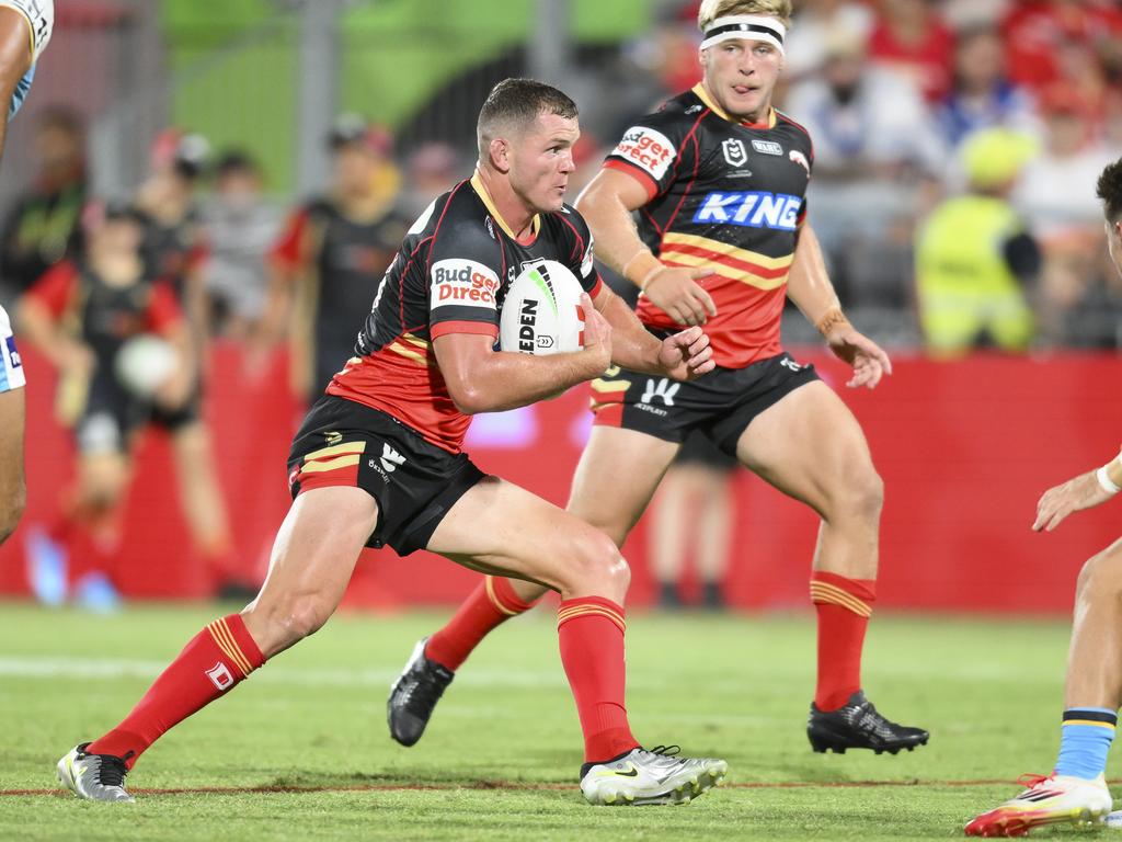 Dolphins skipper Tom Gilbert carts it up against the Titans in the NRL Pre-Season Challenge. Pic: NRL