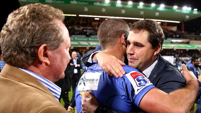 Dave Wessels, then the Force coach, embraces Matt Hodgson after winning the round 17 Super Rugby match against NSW at nib Stadium.