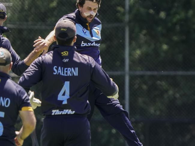 Brighton’s Peter Cassidy celebrates one of his six Malvern wickets. Picture: Valeriu Campan