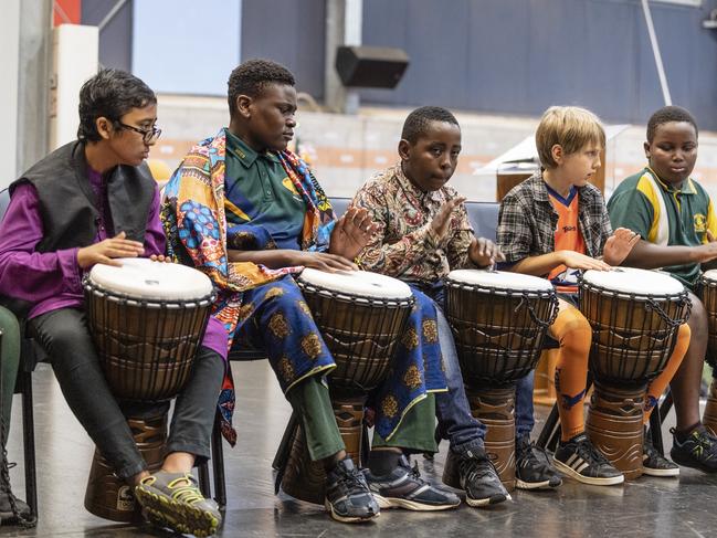 African drumming showcase participants (from left) Nahad Mamud, Joshua Mukeba, Peter Faustine, Cooper Mayers and Elisha Irakiza during Harmony Day celebrations at Darling Heights State School. Picture: Kevin Farmer