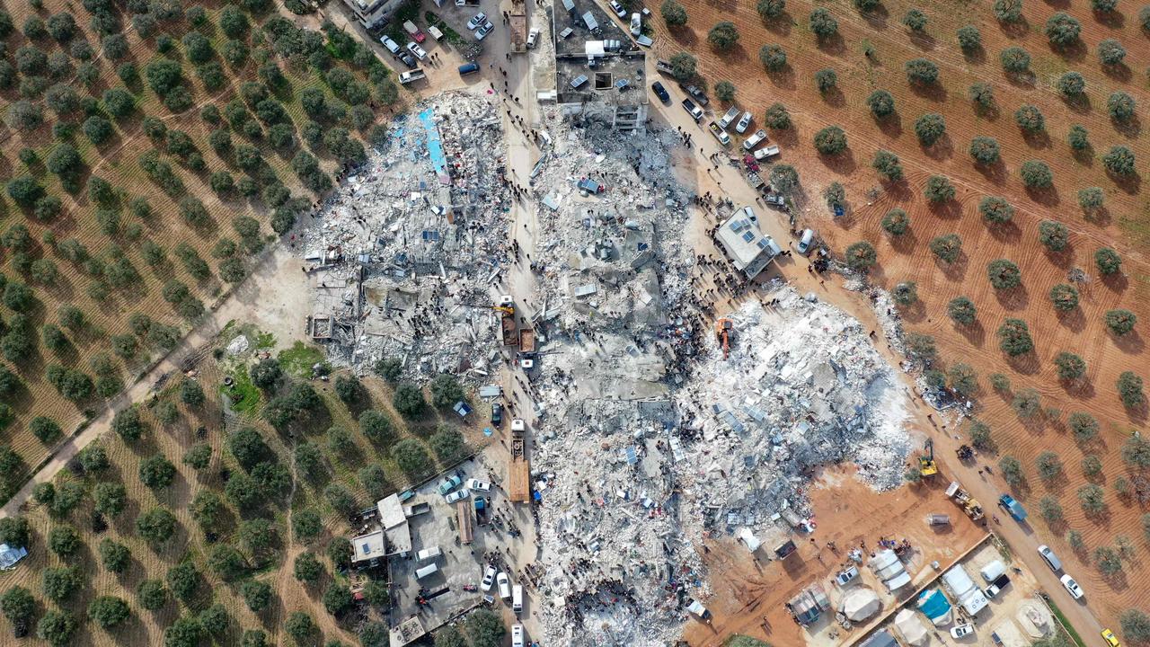 The rubble of collapsed buildings following an earthquake in the village of Besnia near the twon of Harim, in Syria's rebel-held noryhwestern Idlib province on the border with Turkey.(Photo by Omar HAJ KADOUR / AFP)